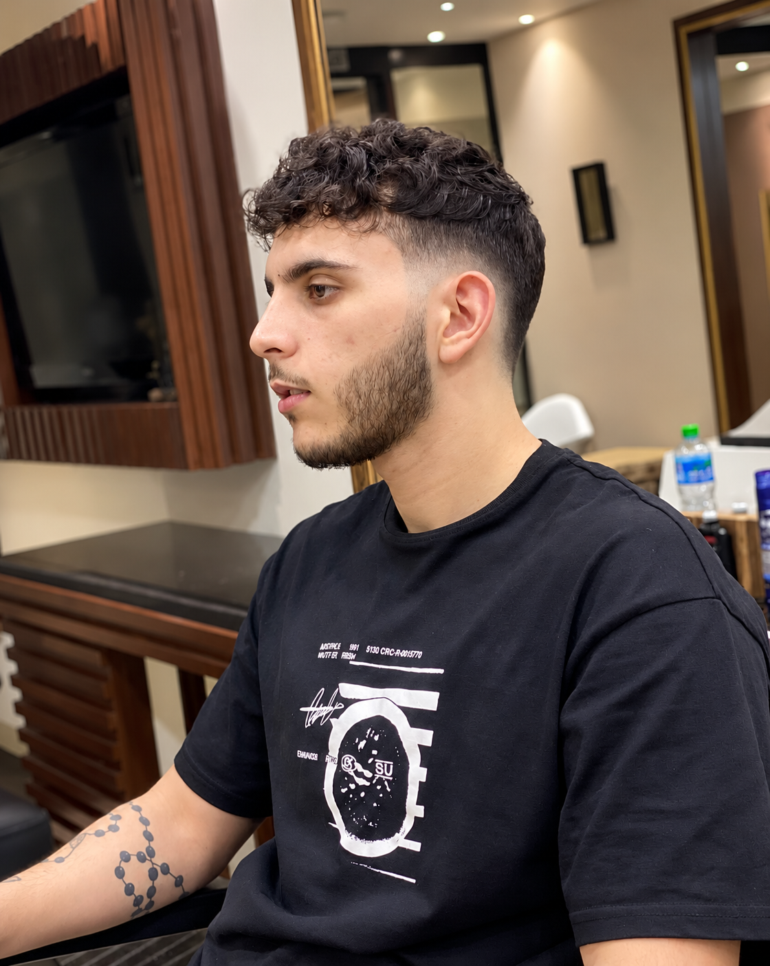 RK Salon client after a textured haircut and fade