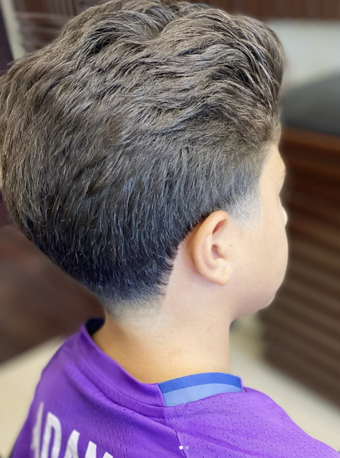 Textured haircut and fade completed at RK Salon